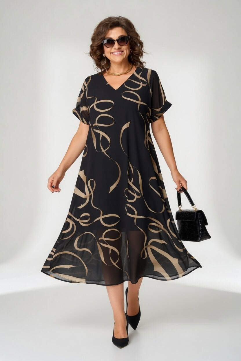 Edmée™ – Vestido fluido gráfico, elegancia con carácter